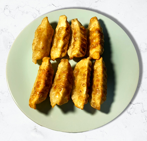4. Pork & Cabbage Dumplings (8)